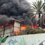 Iranian missile strike in central Israel sets building ablaze